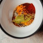 red chili powder on white bowl